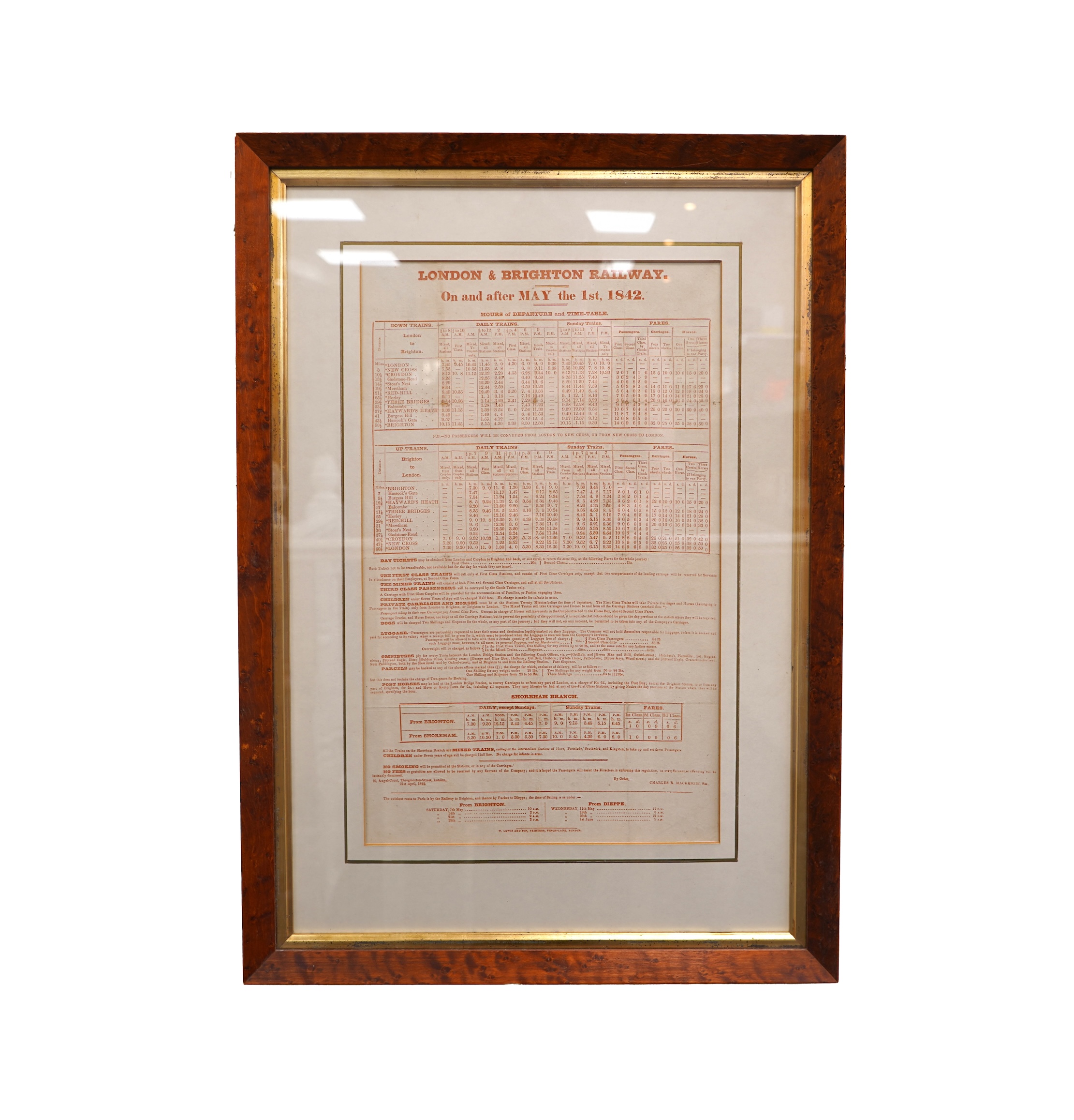 A framed London and Brighton railway timetable ‘On and after May the 1st, 1842’ including the Shoreham branch line at the bottom of the page, in a walnut frame, dimensions of the frame 62 x 44cm